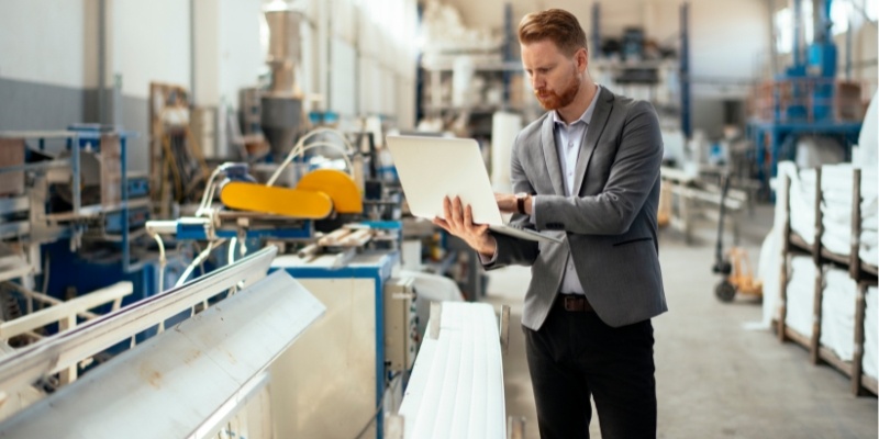 Employee in Warehouse preparing equipment for Auction